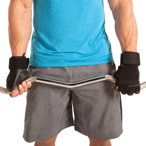 Male wearing Diamond-Tac Wrist Wrap Gloves while holding on to weight bar