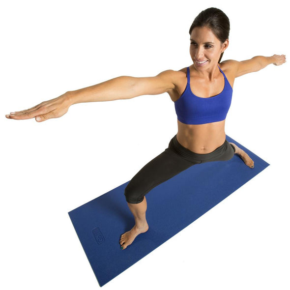 Female doing Warrior 2 Pose on Double Thick Yoga Mat