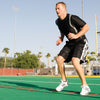 Male performing lateral drills with Agility Ladder 