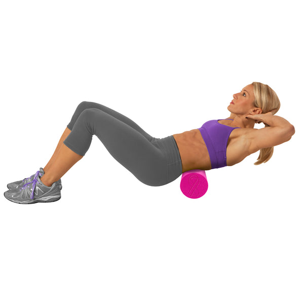 Female rolling mid back with Pink Ribbon Foam Roll