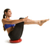 Female performing Boat Pose on Core Stability and Balance Disk