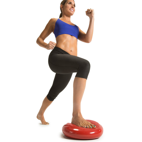 Female lunging on Core Stability and Balance Disk