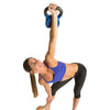 Female doing High Windmill exercise with Contour Kettlebell 