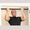 Male performing pull ups with Chin Up Bar in upper mounted position in doorway.