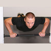 Male performing push up with Chin Up Bar in lower mounted position in doorway.