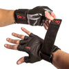 MAle putting on Xtreme Wrist Wrap Gloves with Articulated Grip