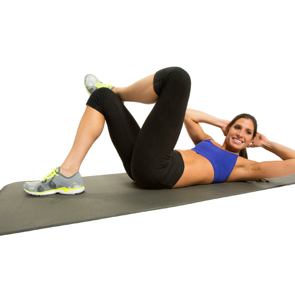 Female performing crunches on Fitness Mat
