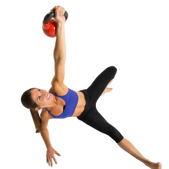Female performing Turkish Getup with 15lb Kettlebell