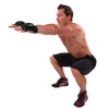 Male squatting w/ Weighted Aerobic Gloves on